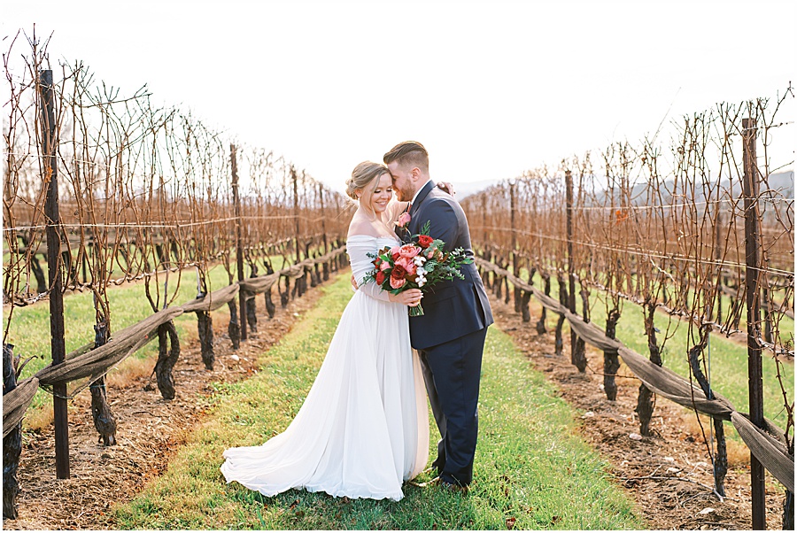 bride and groom photo in grape vines 
