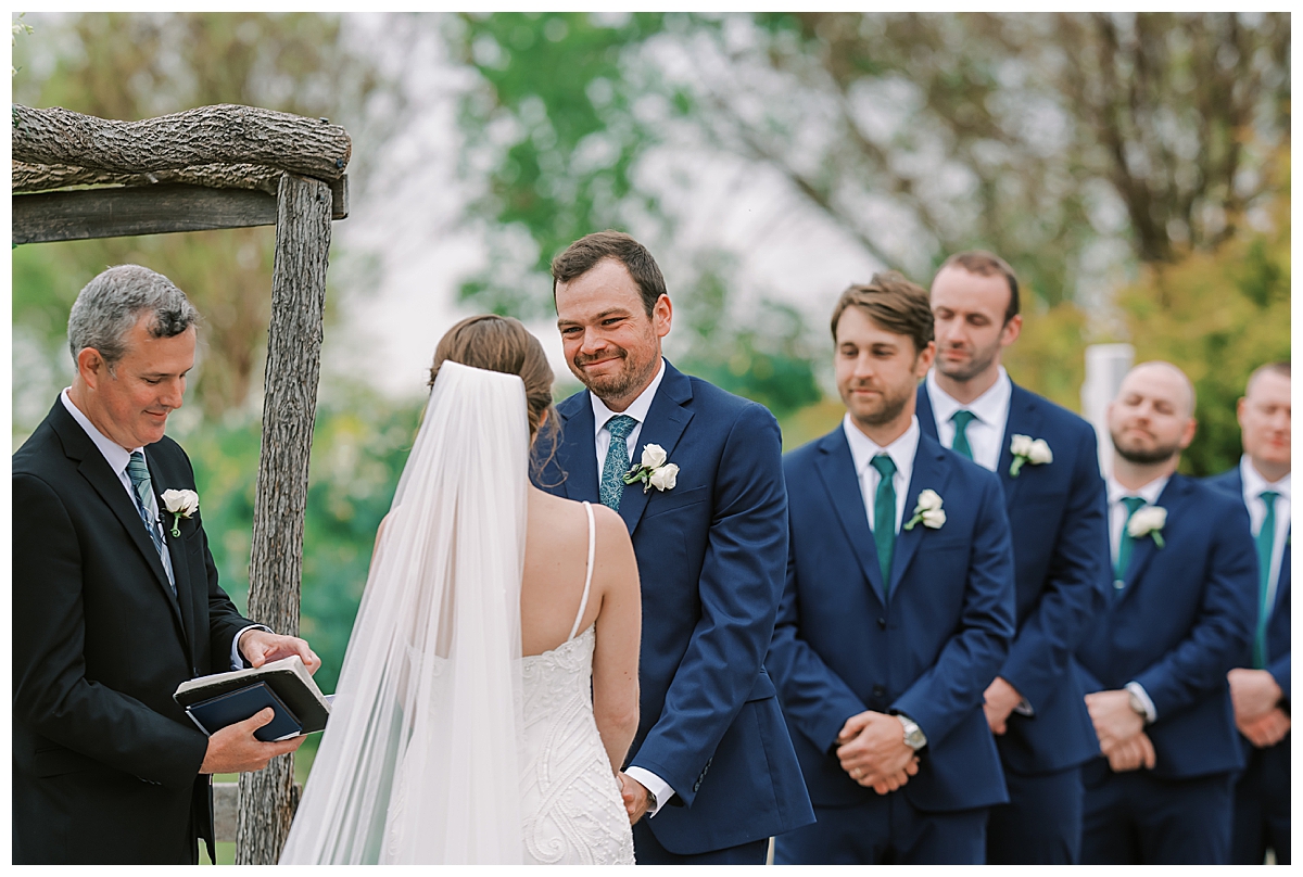groom and groomsmen at wedding ceremony by virginia wedding photographer 