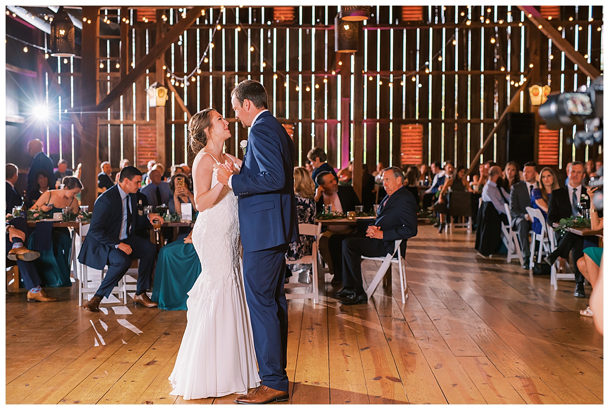bride and groom first dance at riverside at the potomac wedding venue 