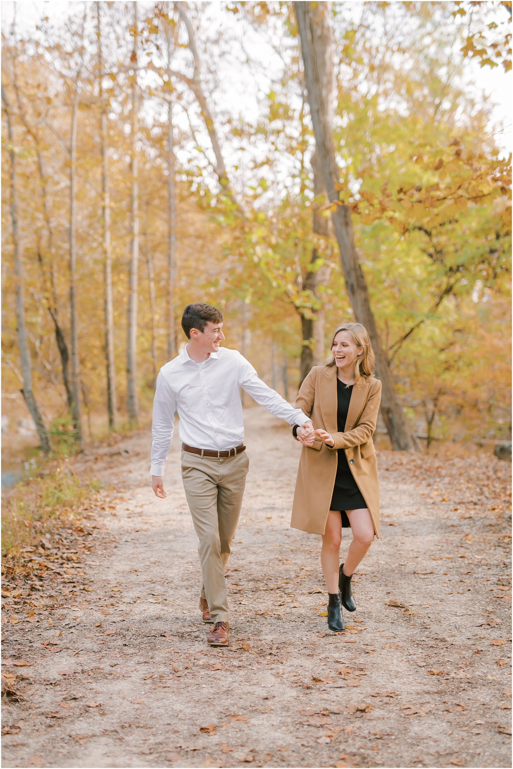 Playful posing autumn engagement session at Great Falls