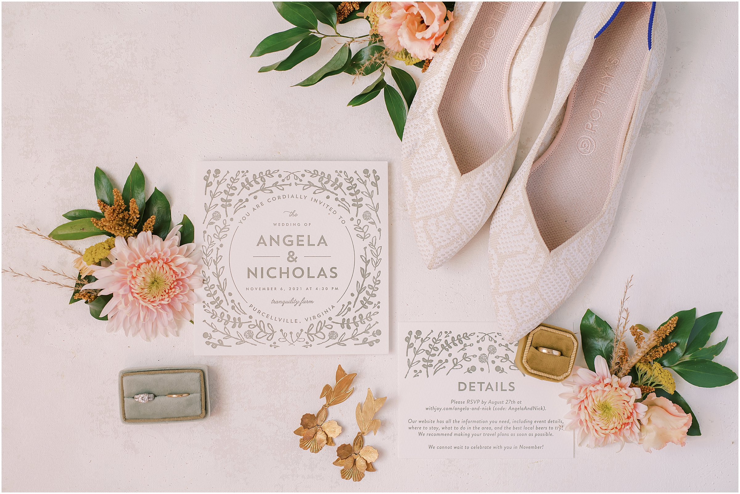 Flat lay with gold and floral details for winter themed market wedding