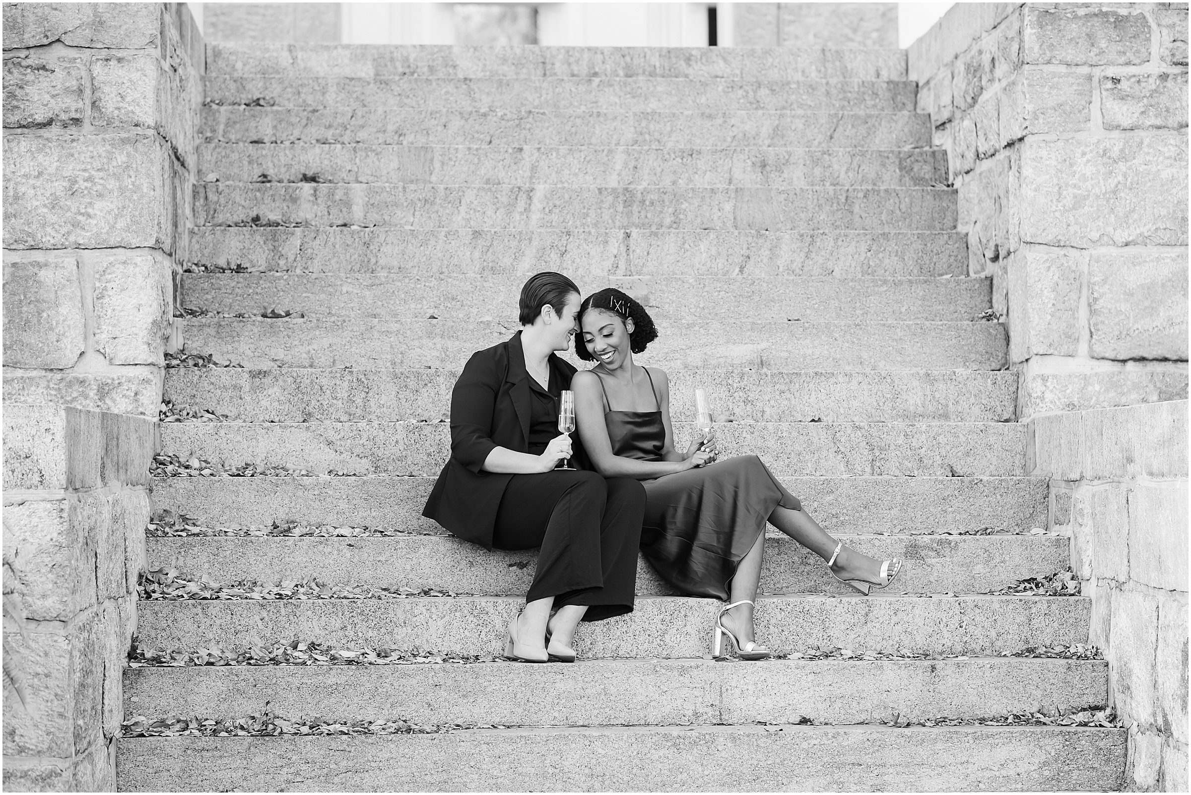 Couple sitting on steps at Patapsco Female Institute