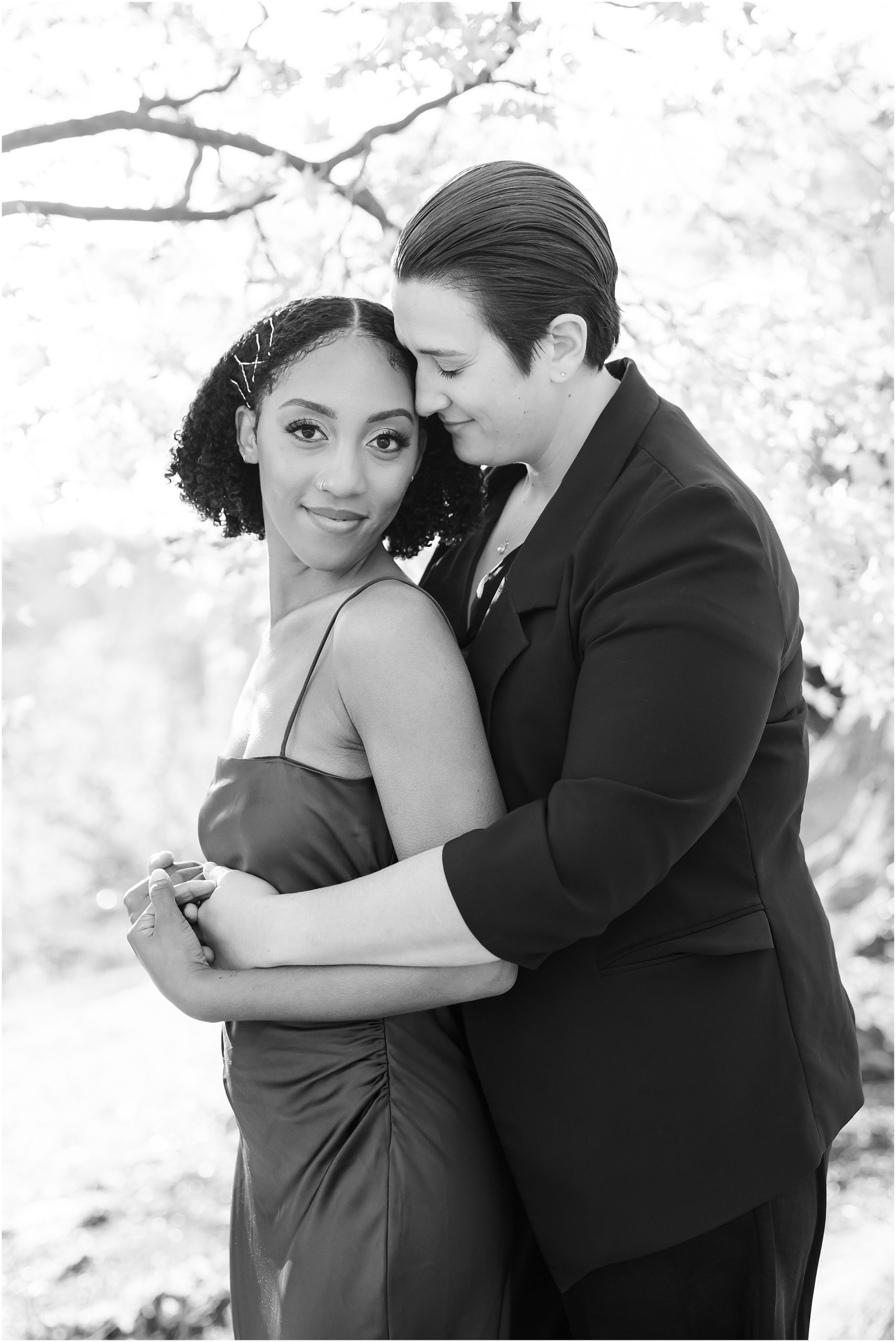 Black and white photo of couple embracing
