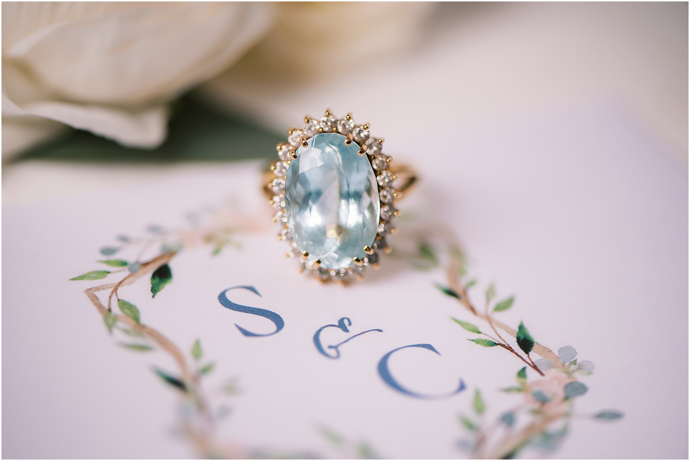 Blue wedding ring with halo diamonds