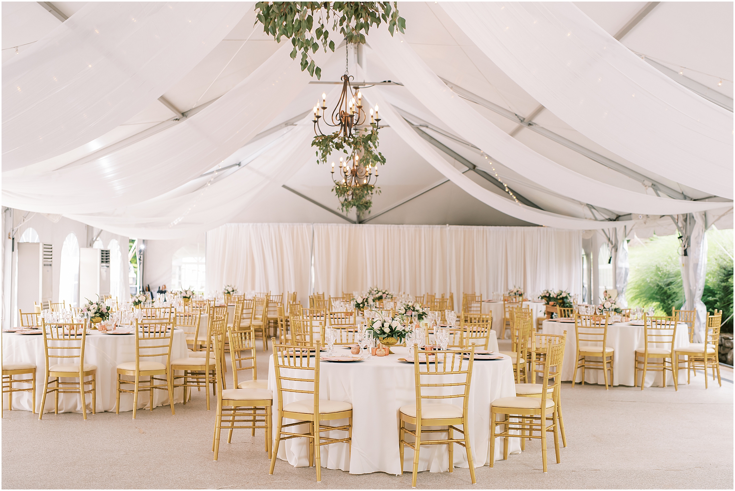 All white tented wedding reception at Rust Manor House