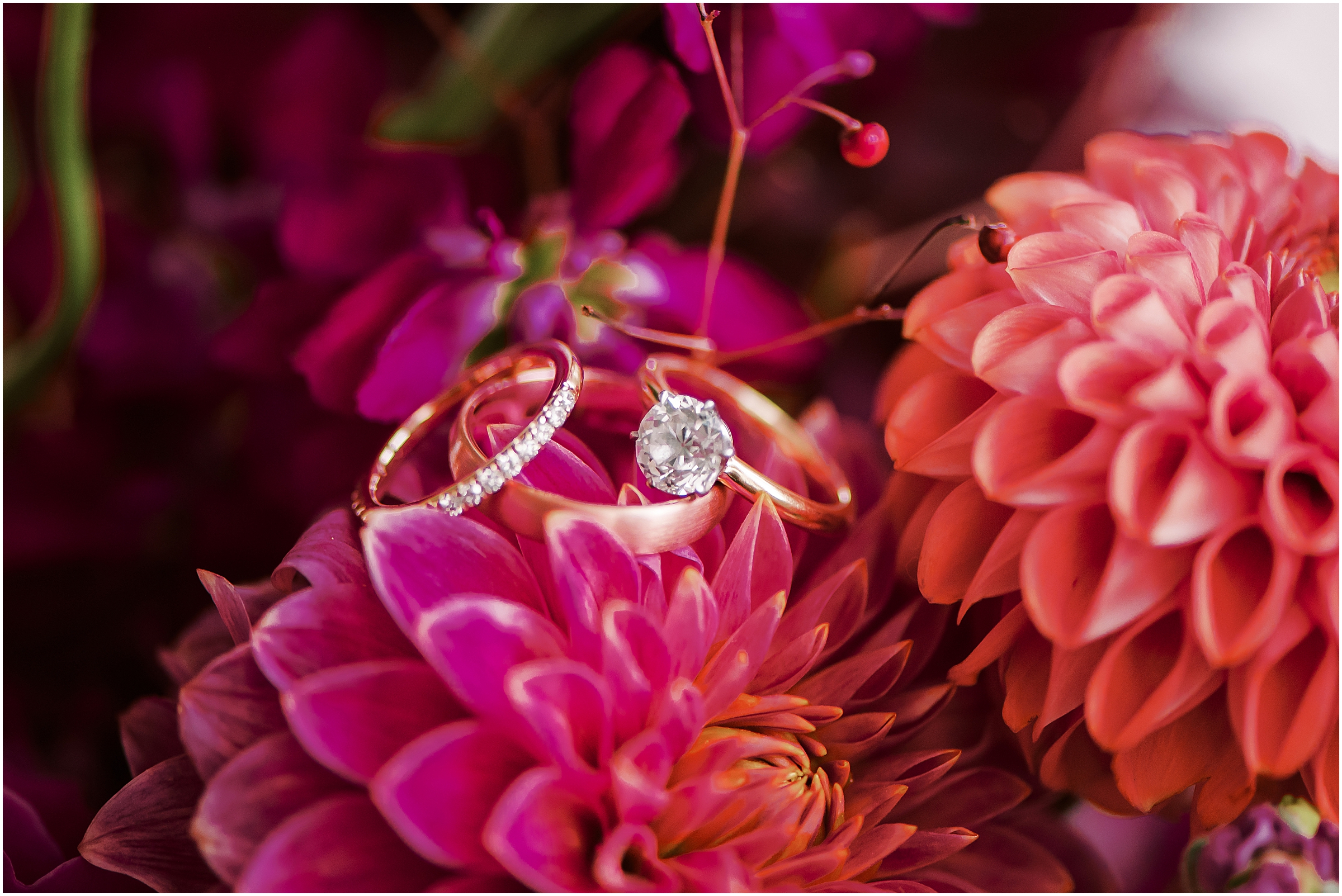 Wedding rings on bold and colorful florals