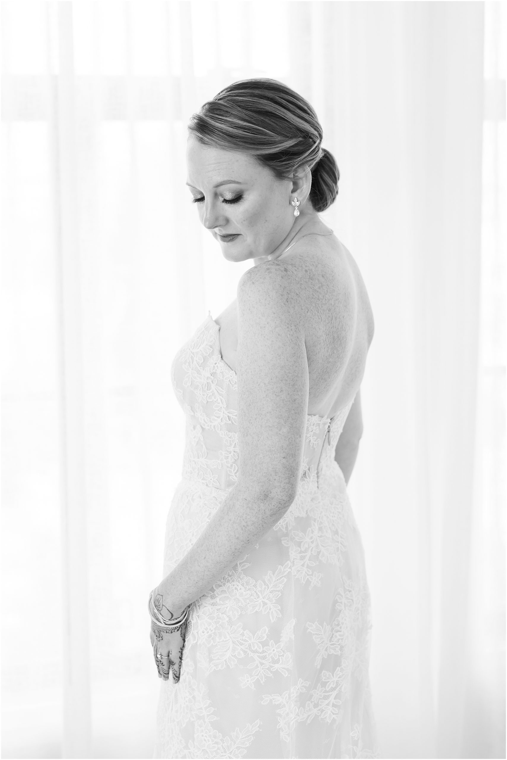Black and white portrait of bride in strapless wedding dress