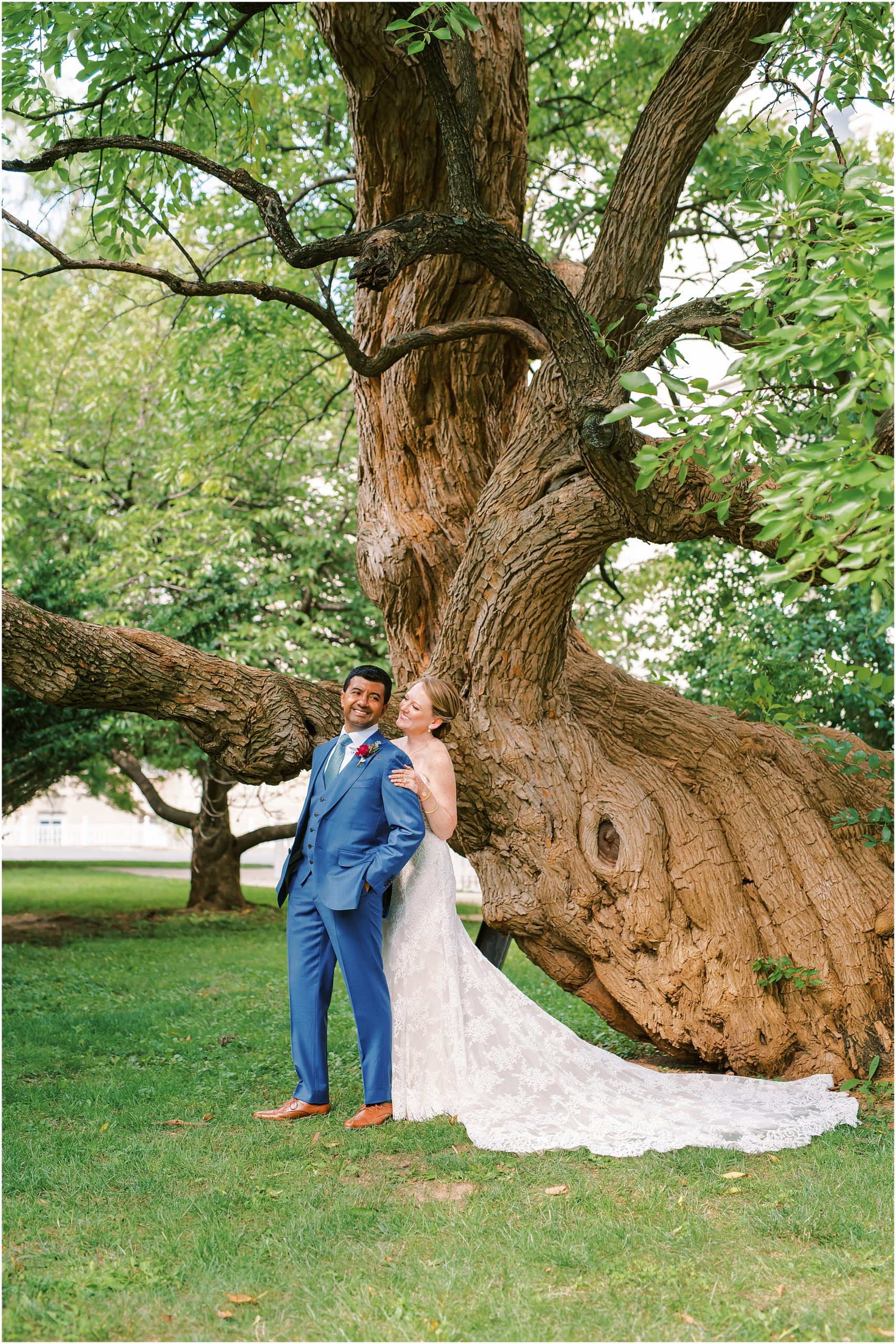 Bride and groom portrait in front of tree at President Lincoln's Cottage