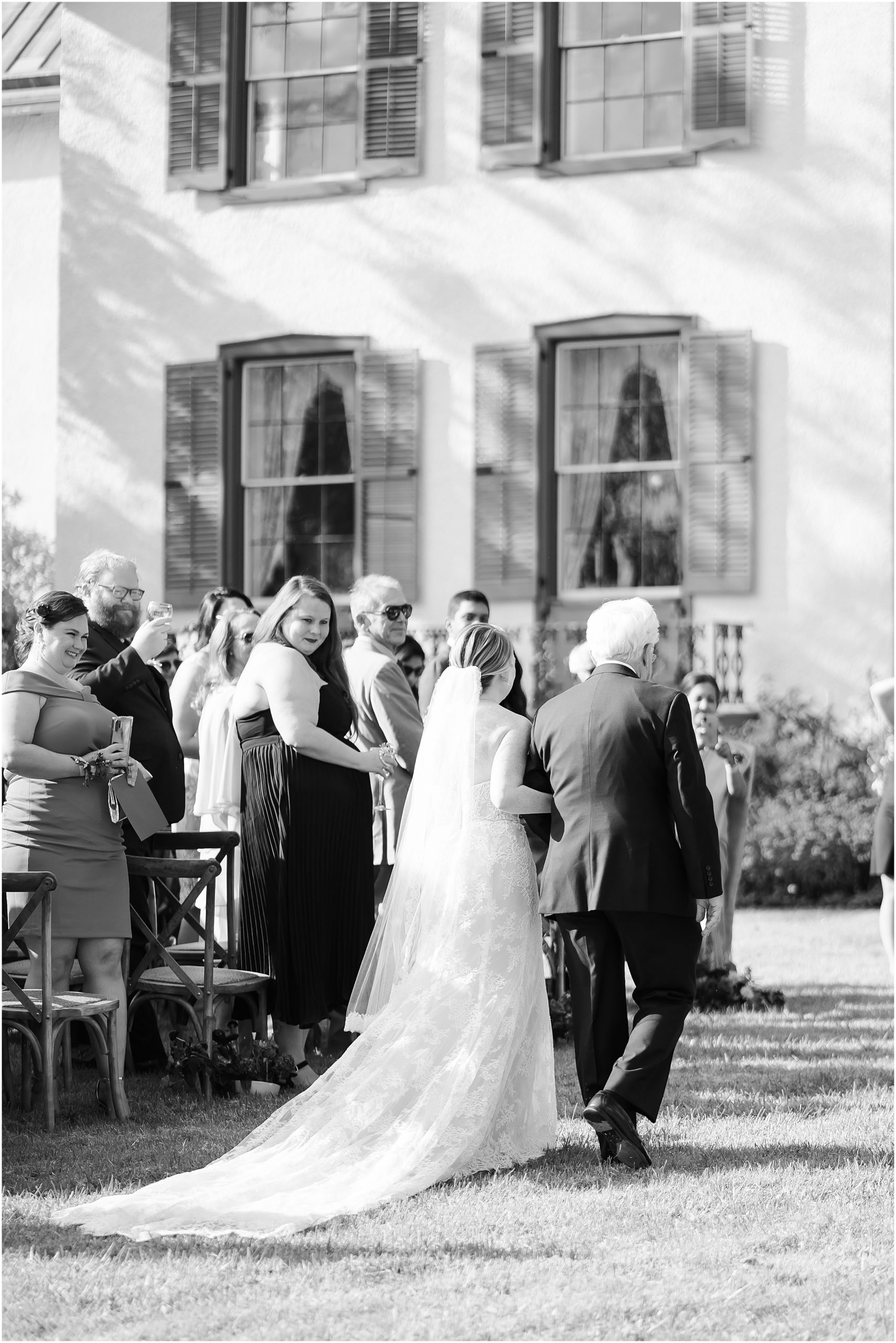 Bride and father walking down the aisle