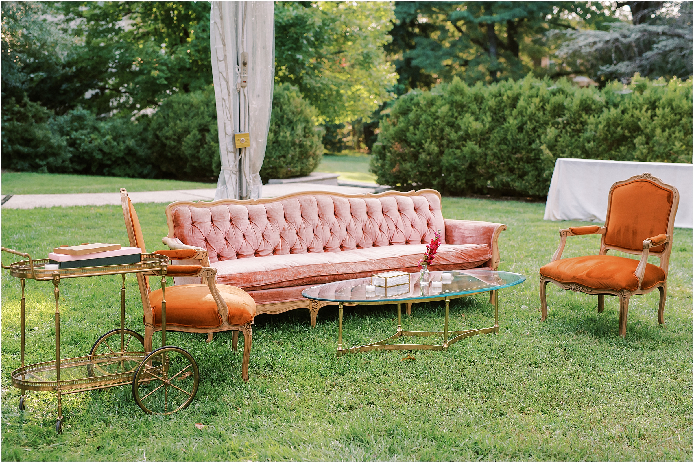 Pink and orange wedding furniture seating rentals