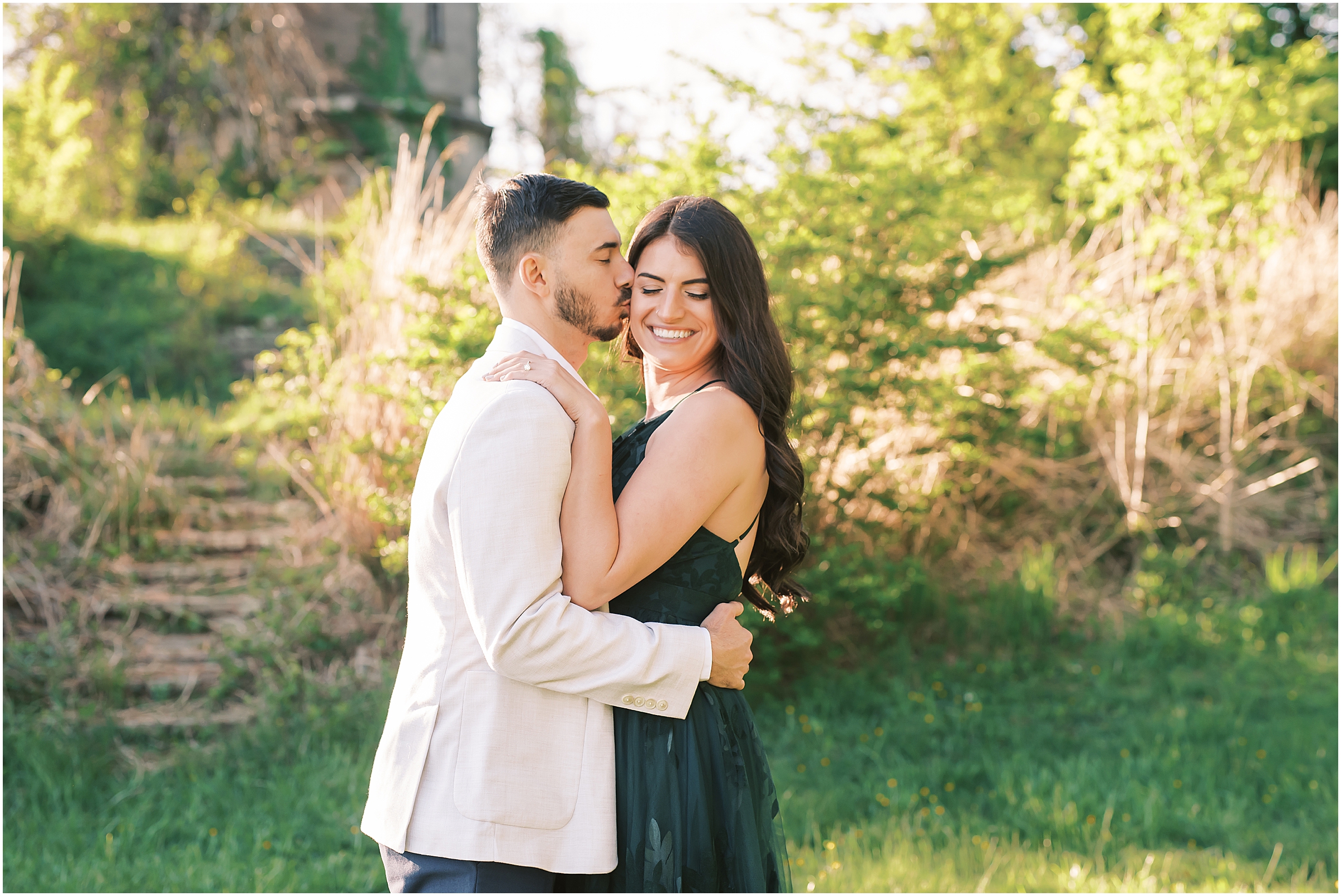Kiss on the cheek during engagement session