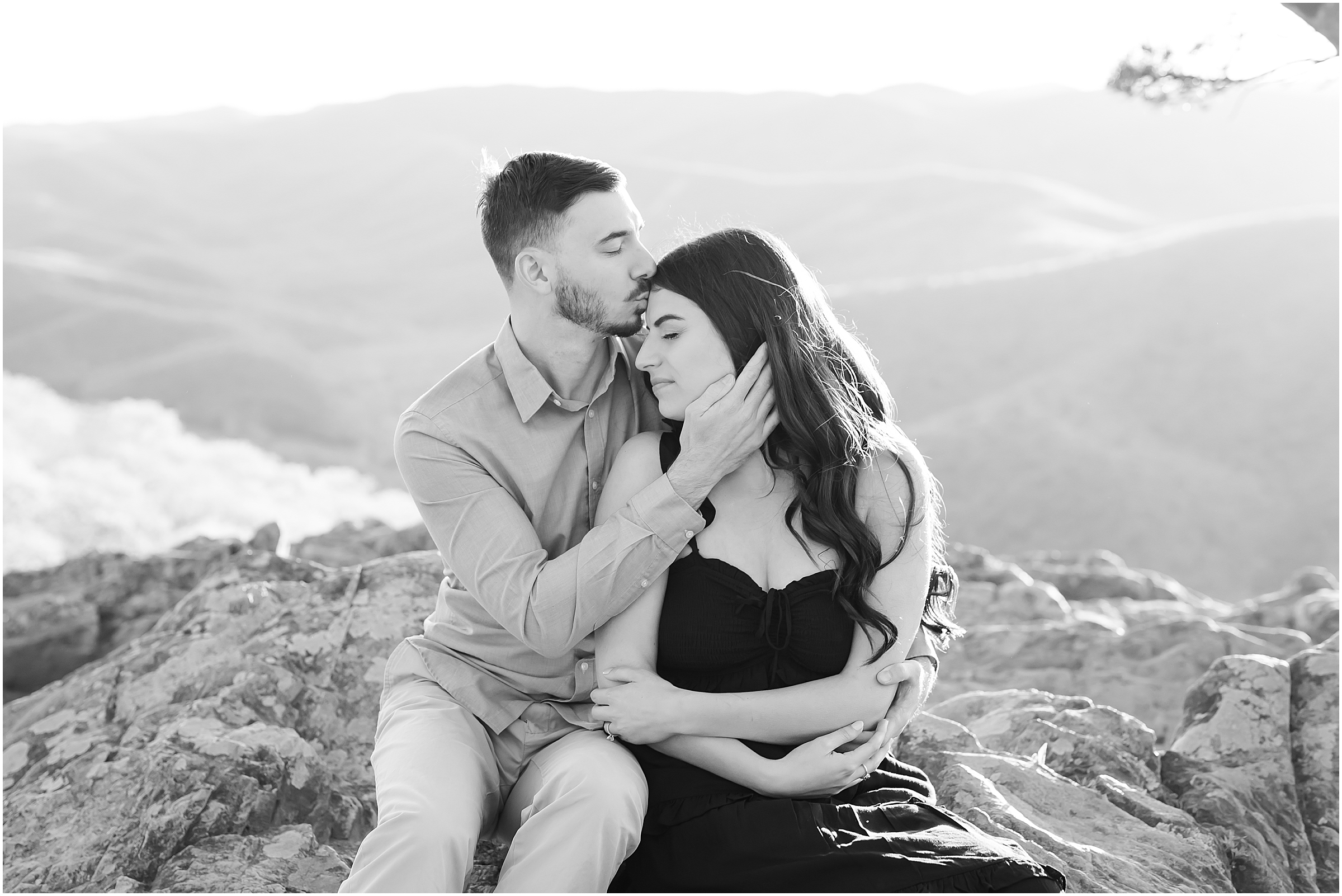 Forehead kiss during Ravens Roost Overlook Engagement Session
