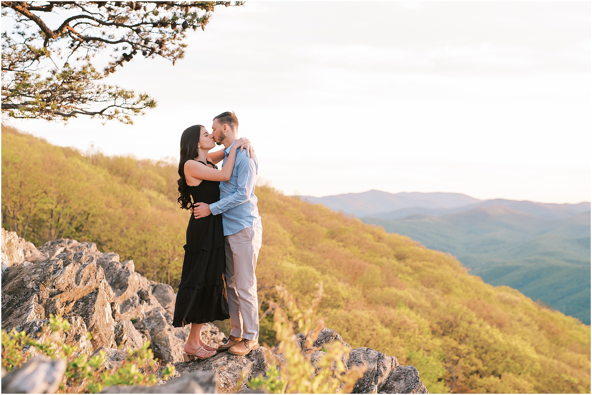 Couple kissing during Ravens Roost Overlook Engagement Session