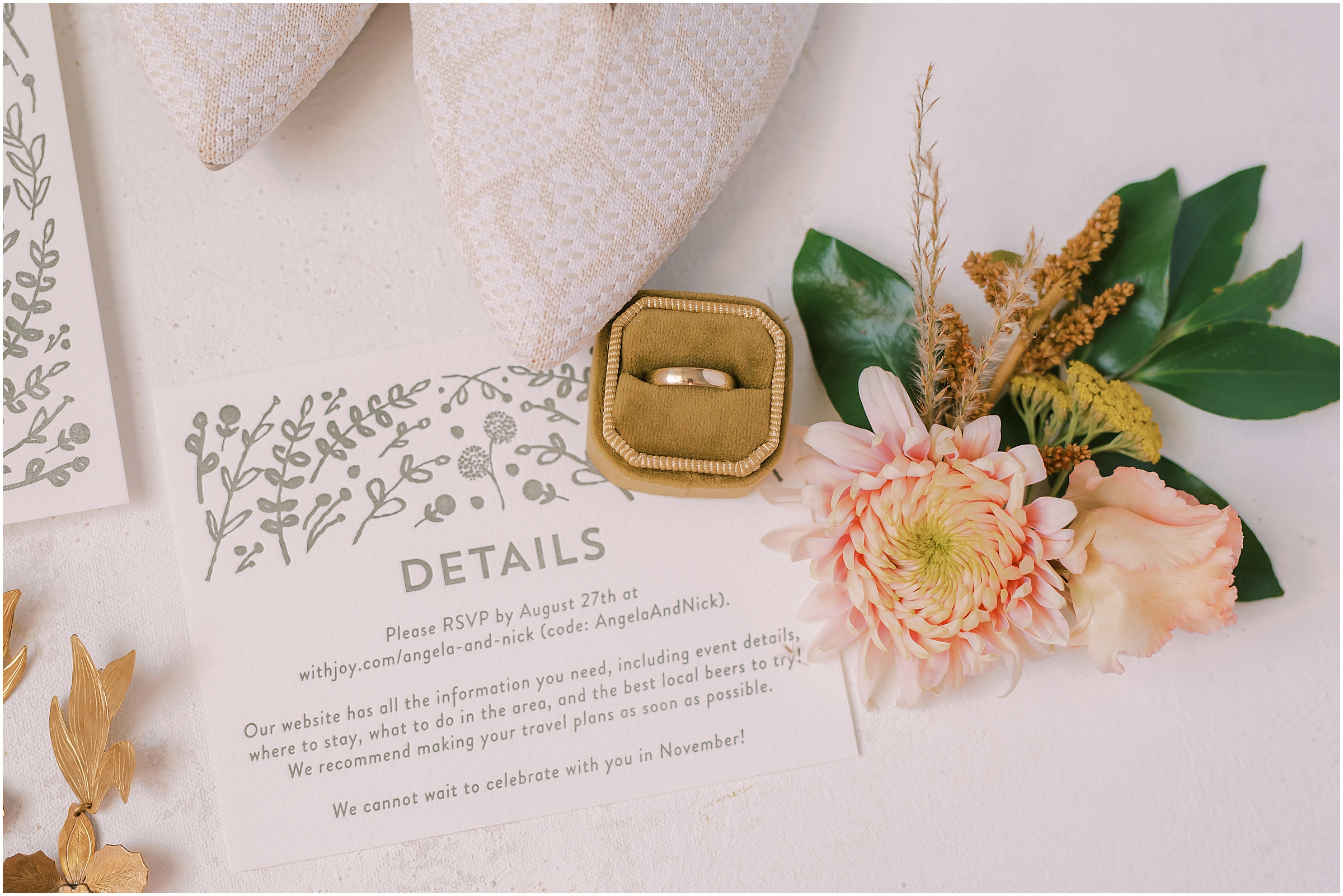 Wedding flat lay with gold and floral details at Tranquility Farm